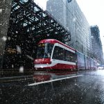 streetcar passing buildings