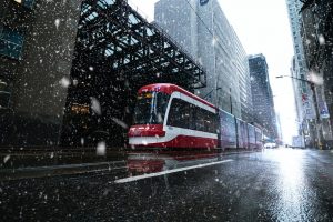 streetcar passing buildings